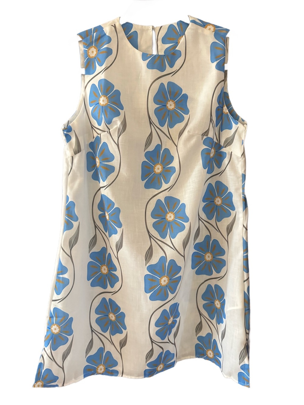NWOT. Cream Sleeveless Shift dress awith Blue Floral Print
